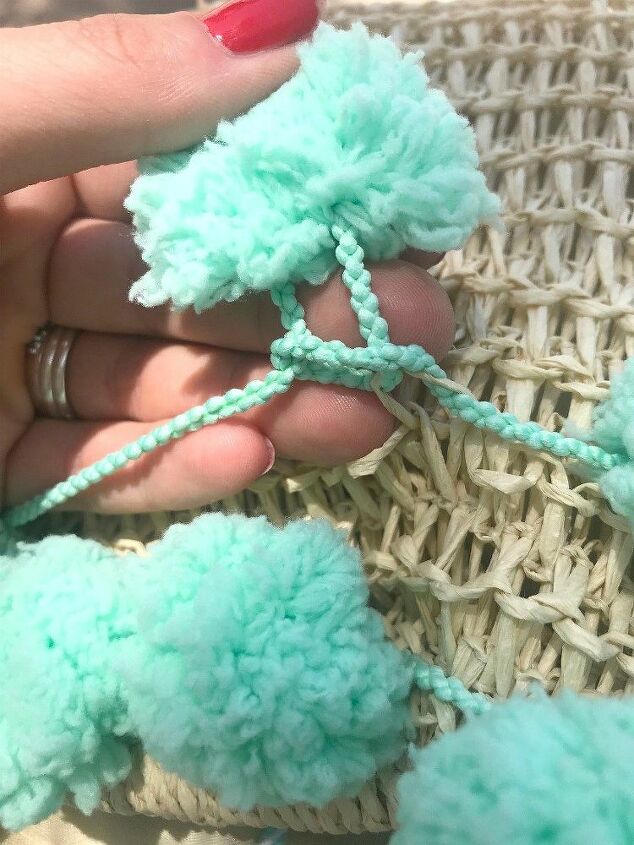 makeover your plain wicker beach tote with pompom yarn