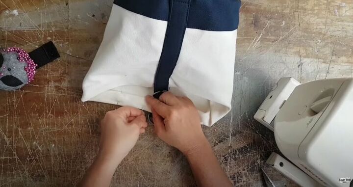 make your own canvas bucket bag with a fun drawstring insert, Sew Down Edge