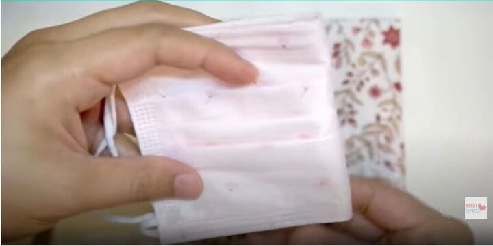 how to sew a face mask without a sewing machine, Fold the disposable mask