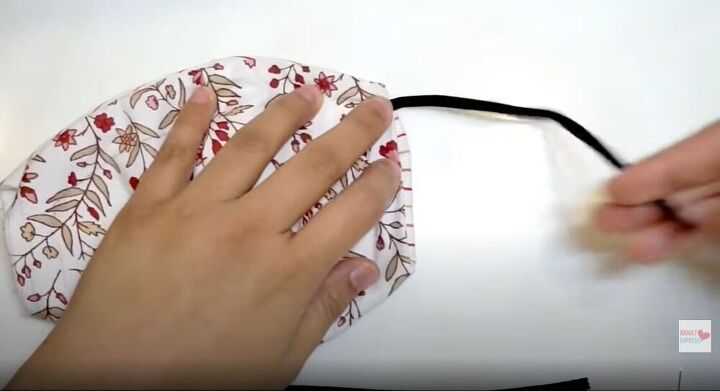 how to sew a face mask without a sewing machine, Place the elastic