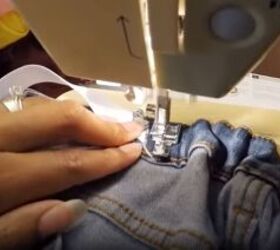 15 amazing ways you can easily alter and upcycle jeans, Sewing the elastic into the jeans waistband