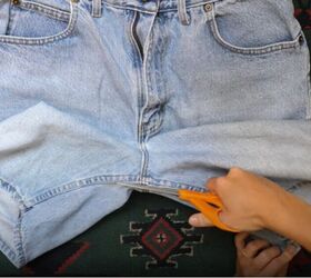 turn a pair of old jeans into a fun new skirt, Cut the crotch seam
