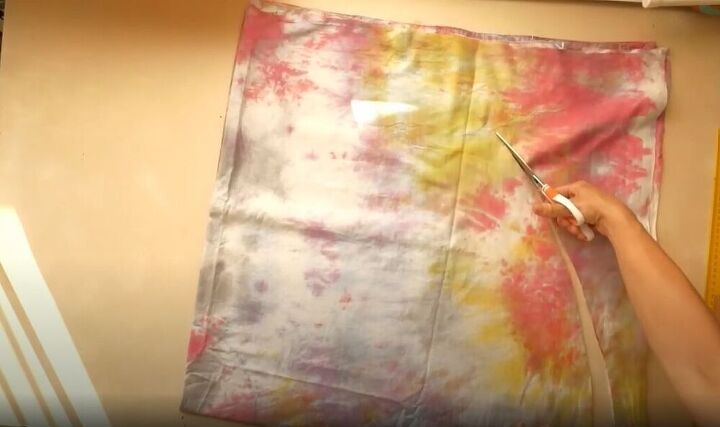 learn how to turn an old bed sheet into a fun and flowy peplum skirt, Cut the fabric