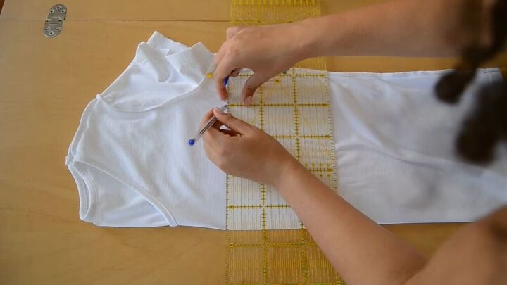 upcycle a boring t shirt into a cool modern one with this tutorial, Cut your T shirt for your DIY upcycle