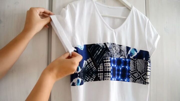 upcycle a boring t shirt into a cool modern one with this tutorial, Fold your sleeves