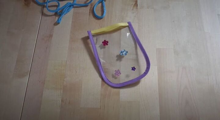 diy an amazing clear vinyl bag and phone pouch, Add jewels