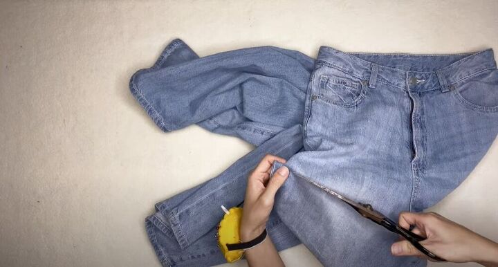 learn to make the cutest crop top from an old pair of jeans, DIY crop top from jeans