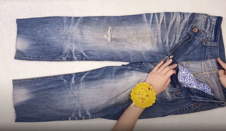 how to make trendy mom jeans out of mens jeans, Sew down the zipper
