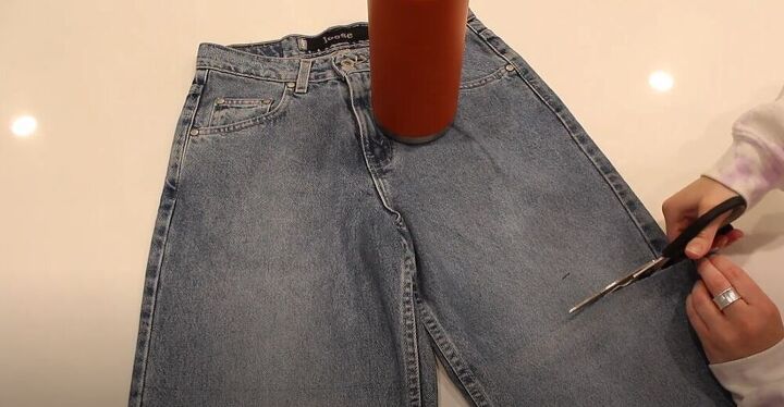 tips and tricks for upcycling your jeans in 10 minutes, Cut the jeans