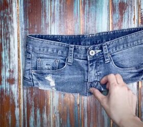 how to make jeans high waisted turning low rise into diy high rise, Cut off the bottom of the zipper flap