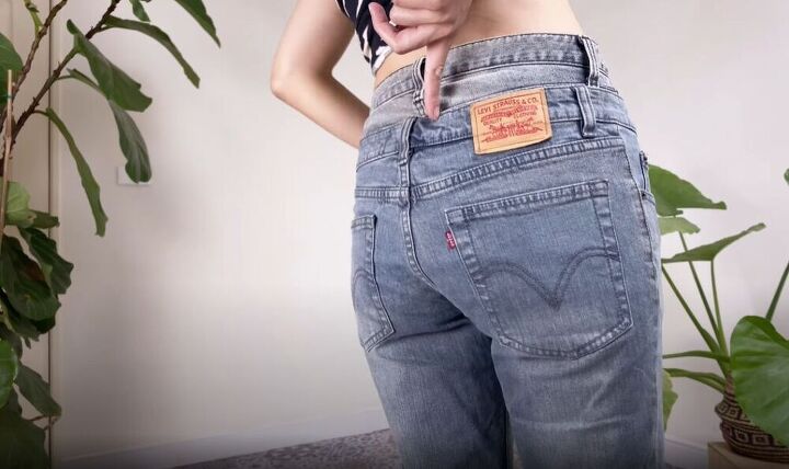 how to make jeans high waisted turning low rise into diy high rise, Trying on the jeans with the extra waistband