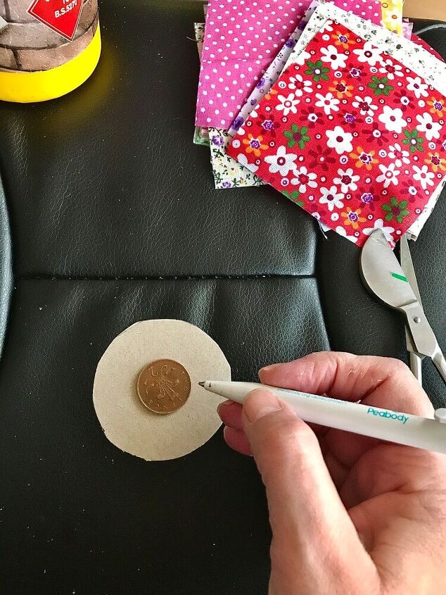 how to make some party earrings from cardboard and fabric, Draw around coin for centre hoop