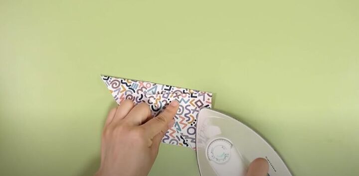 sew along with me for a cute diy coin case, Press the fold