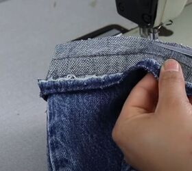 how to sew a euro hem on jeans, Trim the inner seam allowance