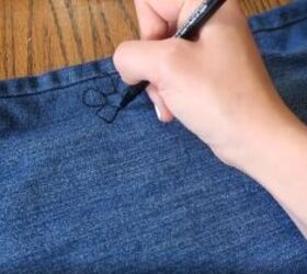 upgrade your jeans with a genius paint trick, DIY painted jeans