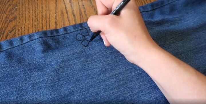 upgrade your jeans with a genius paint trick, DIY painted jeans