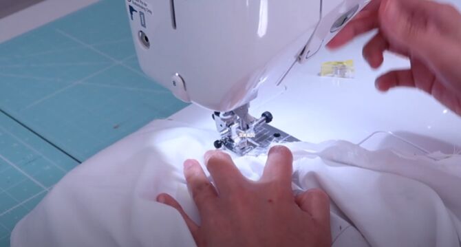 refashion a bedsheet into a 3 layer ruffle skirt, Sew along the zipper seam