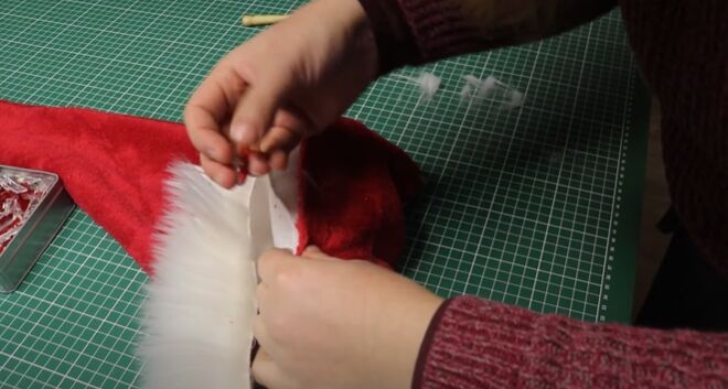 get in the spirit with this diy santa hat, Place inside the hat