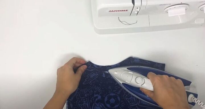 how to make a sweatshirt, Press the neckline