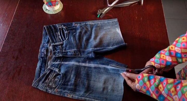 out with the old upcycle jeans for an awesome denim skirt, Mark and cut jeans