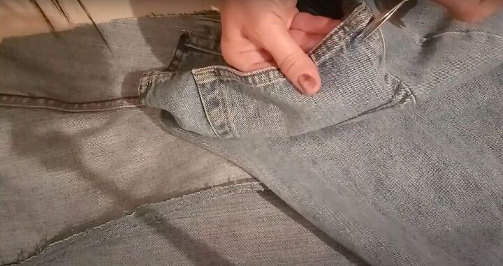 thrift flip how to upcycle jeans, Cut off the pockets