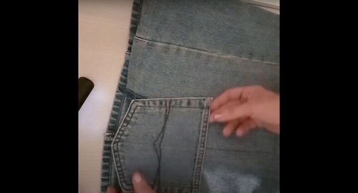 thrift flip how to upcycle jeans, Patch the skirt with the pocket
