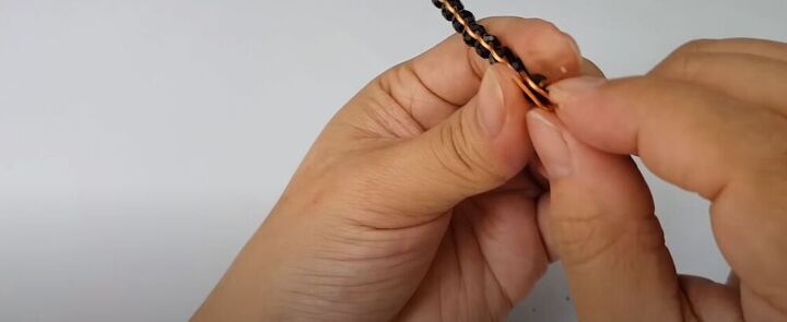 handmade 3 strand braided bracelet, Fold over the left strand