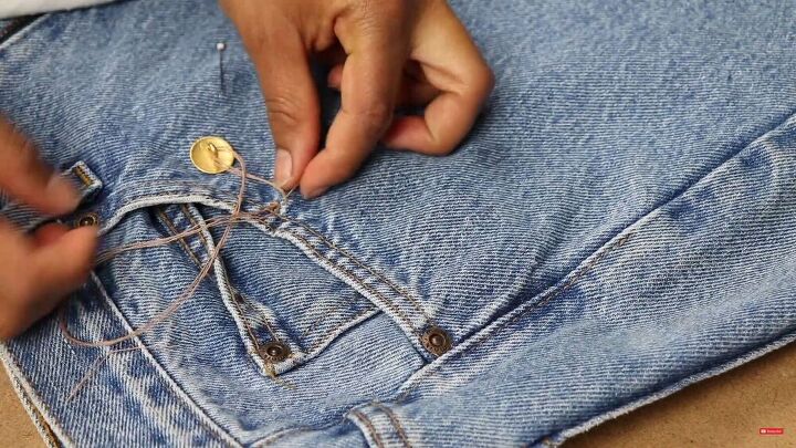 make a unique diy denim skirt that looks store bought, Add a new button
