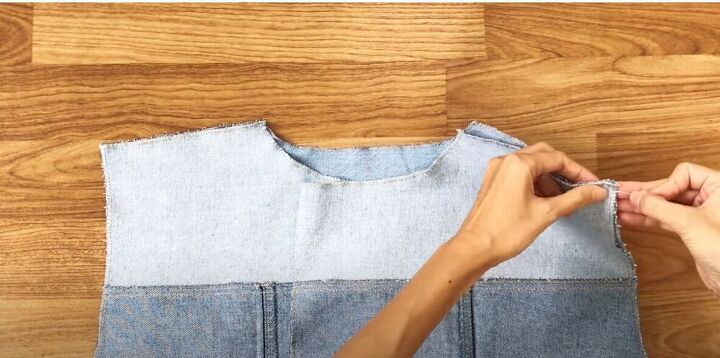 upcycle mens jeans into a stylish denim jacket, Sew the shoulder seams
