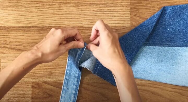 upcycle mens jeans into a stylish denim jacket, Finish the sleeves