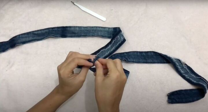 how to transform old jeans into a diy denim skirt, Sew the belt
