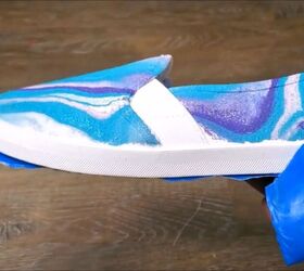 how to hydro dip shoes with spray paint super fun easy tutorial, Peeling off the painter s tape from the shoe