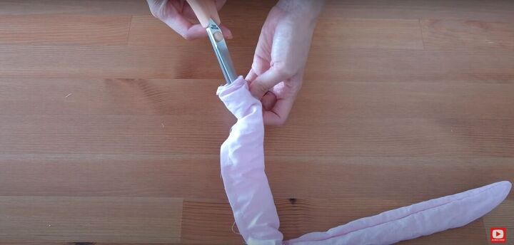 quick diy bow scrunchies to make with scrap fabric, Push the ends in with a scissor