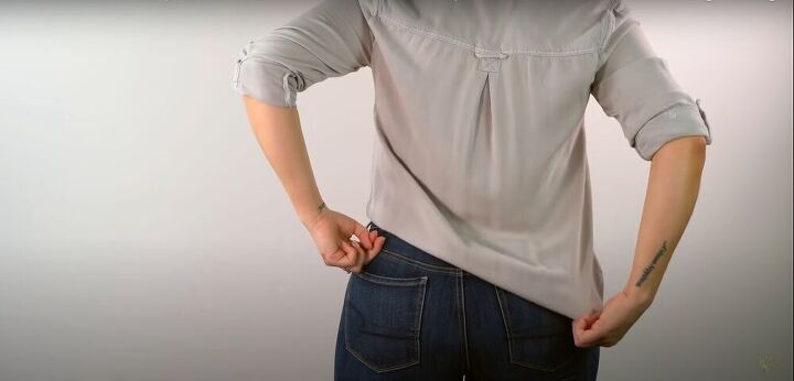 how to tuck in a shirt tips and tricks to elevate your look, Fold the fabric under in the back