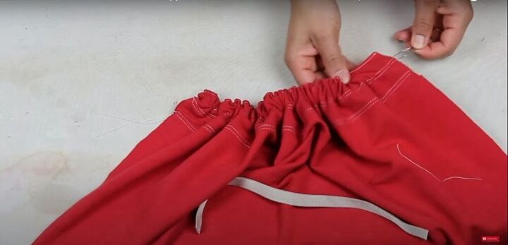 how to sew a t shirt dress with a cutout in the back, Pull the elastic through the tunnels
