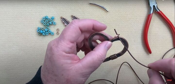step by step beaded leather necklace tutorial, Place the heart on the leather cord