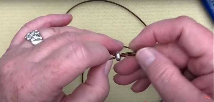 bohemian jewelry tutorial featuring leather necklace knots, Insert the second cord into the clasp