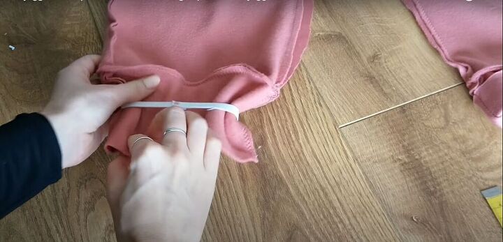 how to make sew an easy sweatpants pattern with pockets, Place the elastic around the cuffs