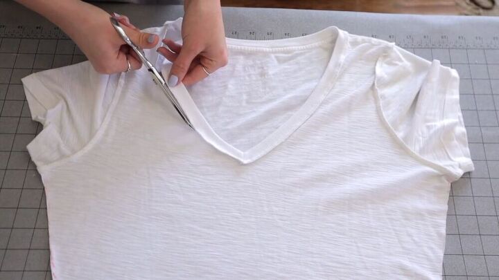 3 quick easy diy t shirt hacks that will transform your old tees, Cutting out the collar of the t shirt