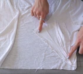 3 quick easy diy t shirt hacks that will transform your old tees, Pinning the triangles to the edges of the t shirt