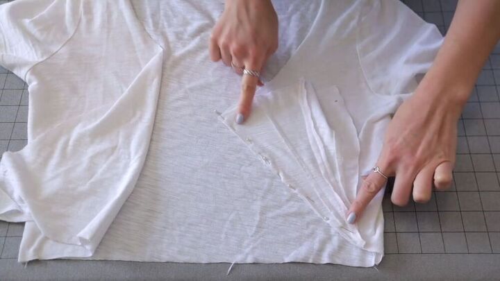 3 quick easy diy t shirt hacks that will transform your old tees, Pinning the triangles to the edges of the t shirt