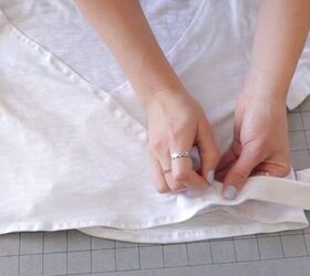 3 quick easy diy t shirt hacks that will transform your old tees, Sewing the straps to the bottom corners