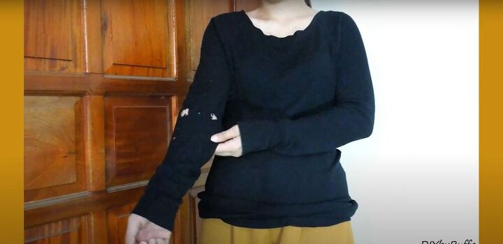 how to make 2 different diy crop tops out of 1 old shirt, Old long sleeved shirt before the thrift flip
