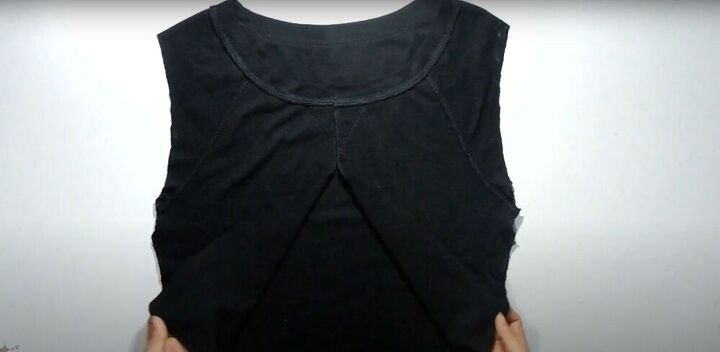 how to make 2 different diy crop tops out of 1 old shirt, Cutting up the shirt to make a crop top