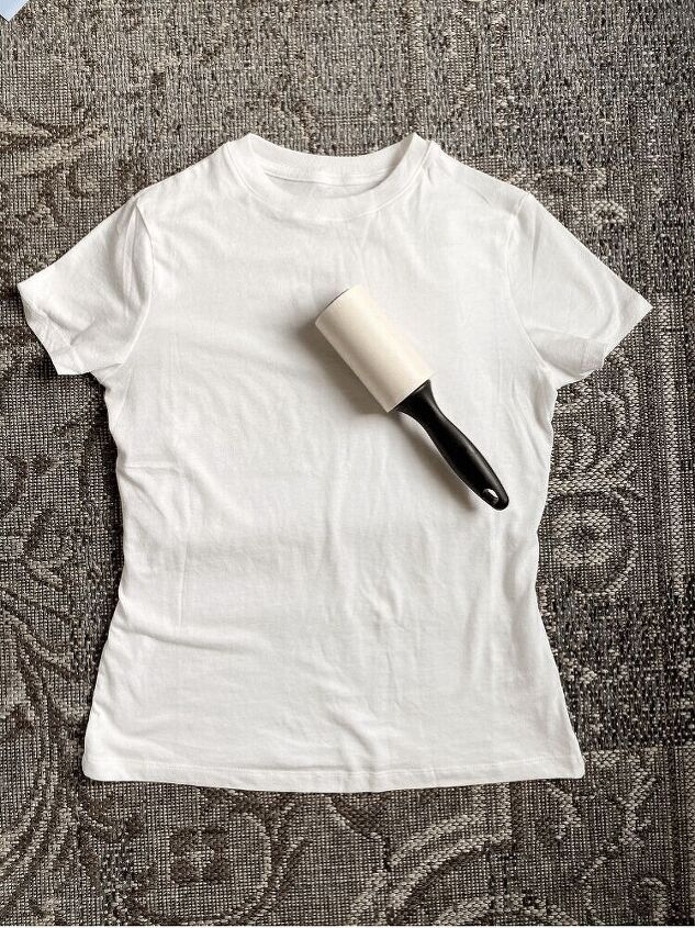 how to make a t shirt with cricut s infusible ink, Lint rolling the t shirt
