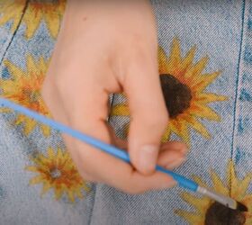 upcycle jeans to make a pretty romantic sunflower top, Paint on a sunflower design