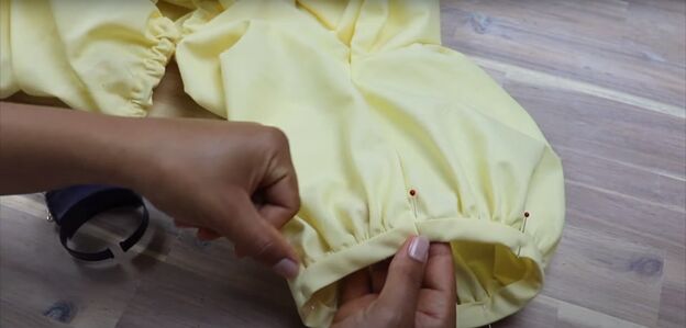 how to sew a beautiful cecilie bahnsen dress out of an old bedsheet, Hemming the sleeves of the dress