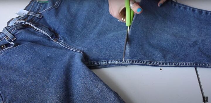 make your own adorable jean shorts with patches without sewing, Cutting the denim