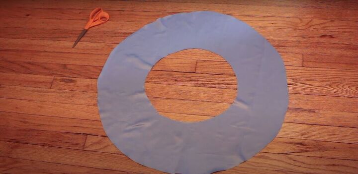 how to make a fabulous a line skirt out of an abandoned curtain, Cutting out a circle shape for the flounce