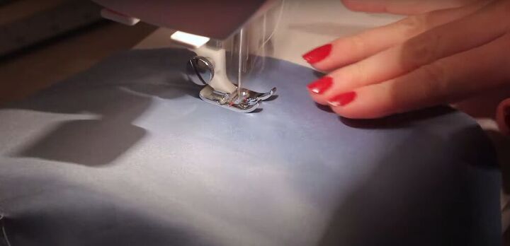 how to make a fabulous a line skirt out of an abandoned curtain, Sewing the side seams on a sewing machine